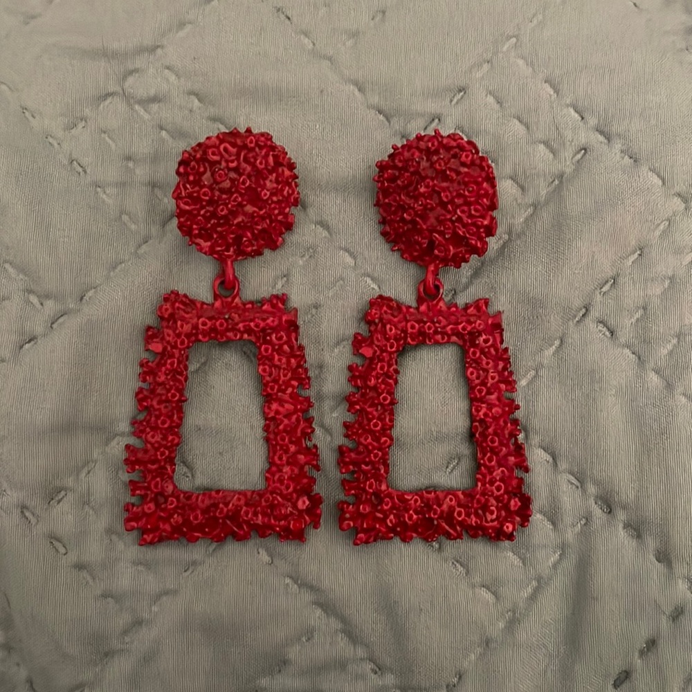 Red dangling earrings